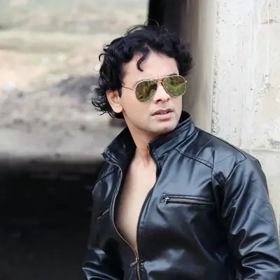Man in a leather jacket outdoors as the destination scene